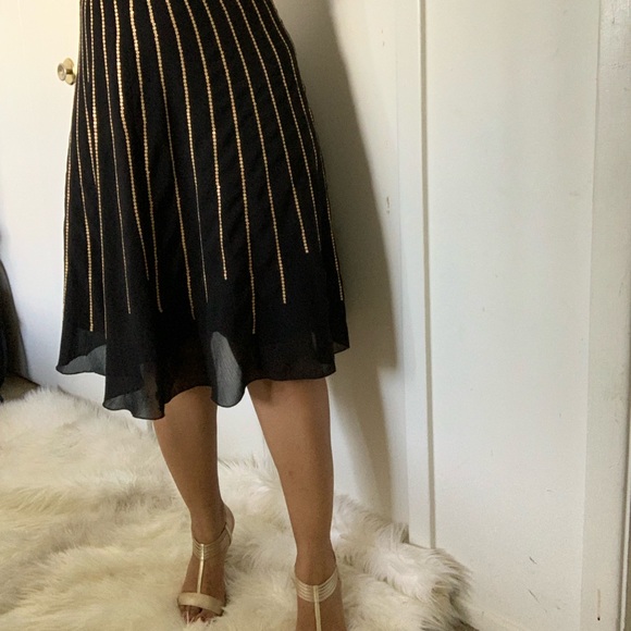 Black Chiffon-like Skirt; with flat gold sequins. - Picture 3 of 6